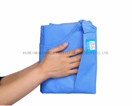 Quirúrgica no tejida Bata quirúrgica reforzada desechable no tejida y bata quirúrgica azul con puño de punto